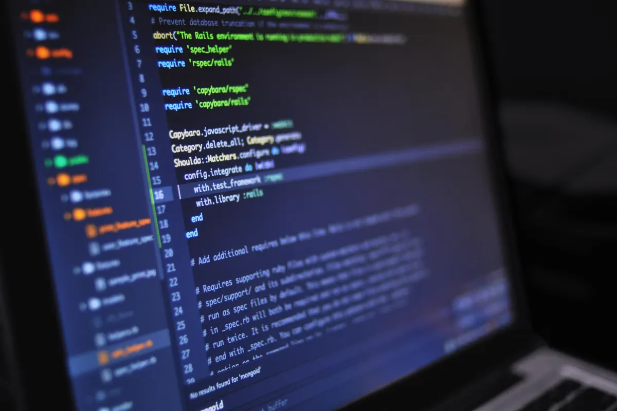 Close-up of a code editor on a laptop screen, the setting of an AI-assisted coding round