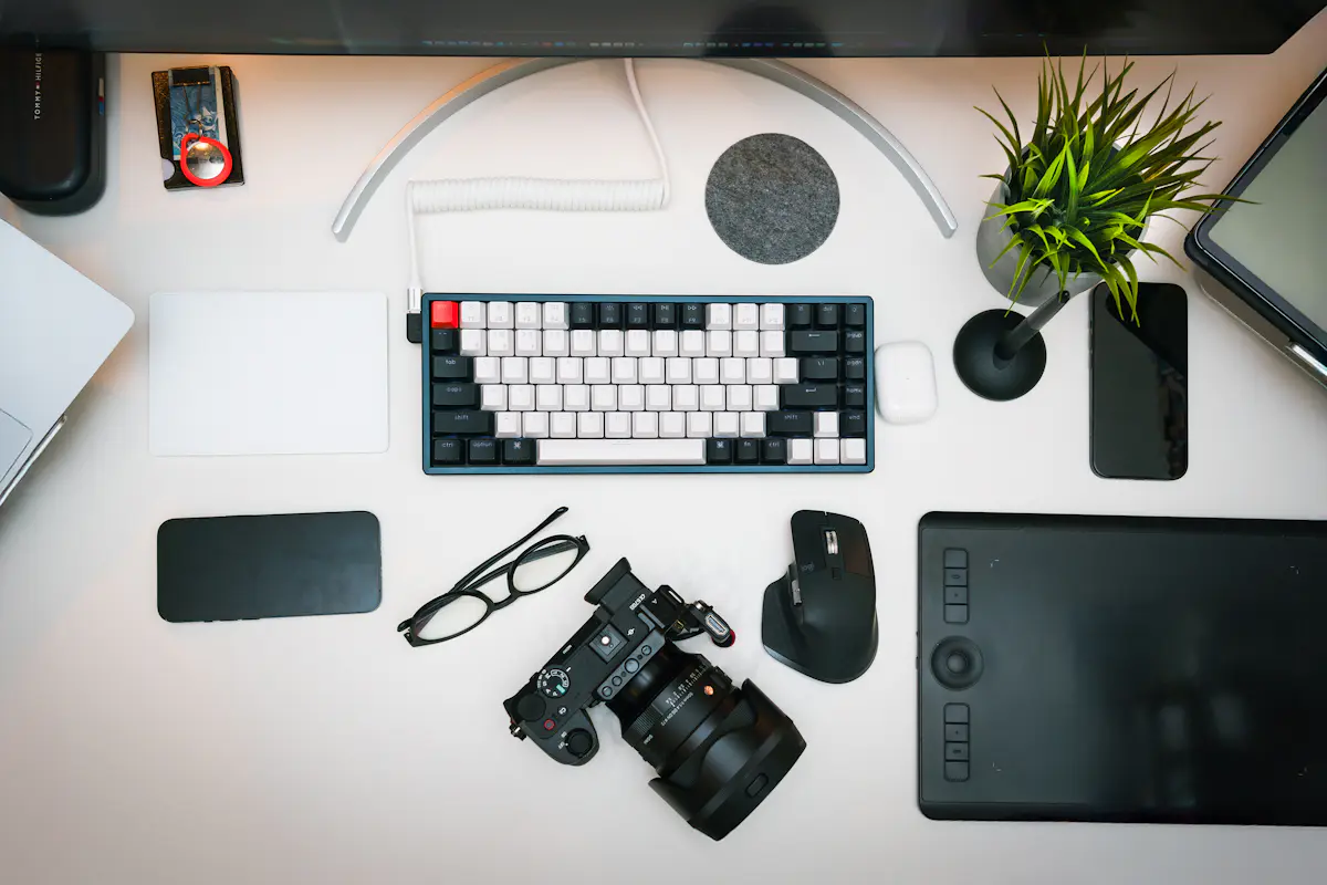 Overhead view of a desk with a keyboard and camera, set up for recording an AI behavioral interview