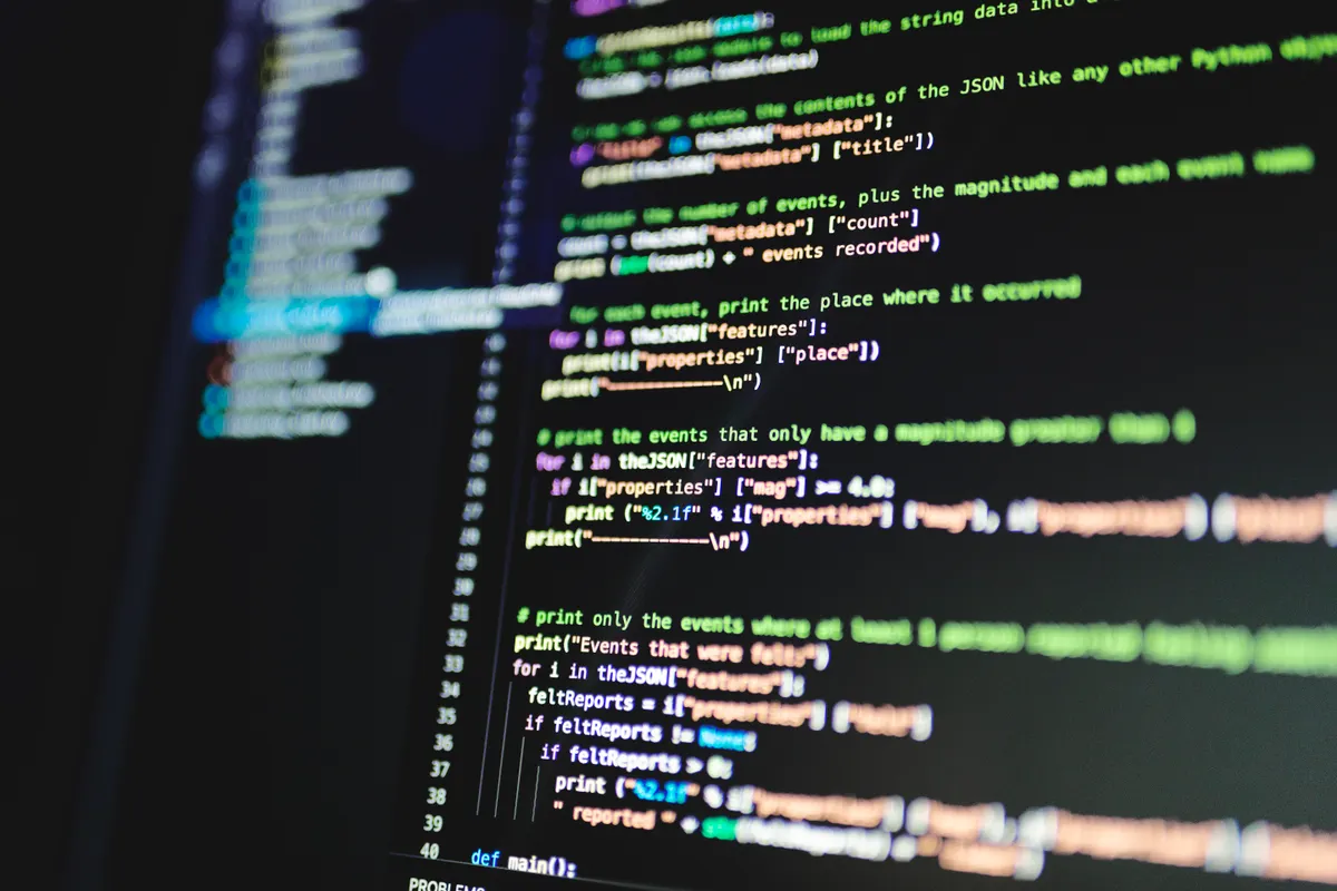 Close-up of code on a monitor, the kind of problem solved in an algorithm round