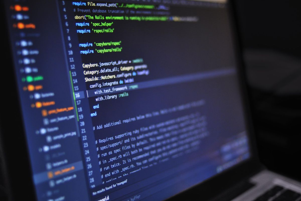 Close-up of code on a laptop screen, illustrating an Android pagination race condition bug